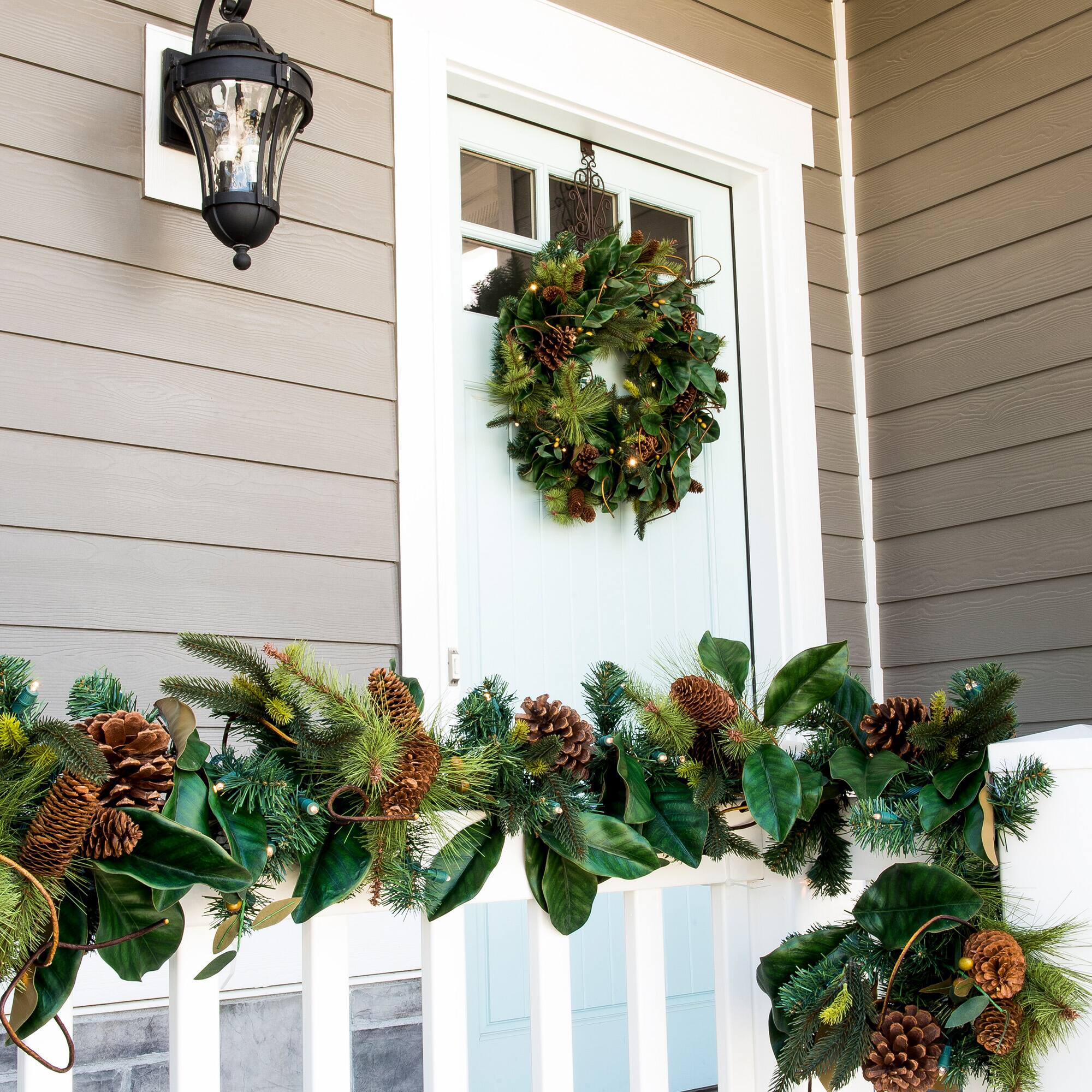 Village Lighting 30" Pre-Lit Magnolia Leaf Christmas Wreath, Clear LED Lights